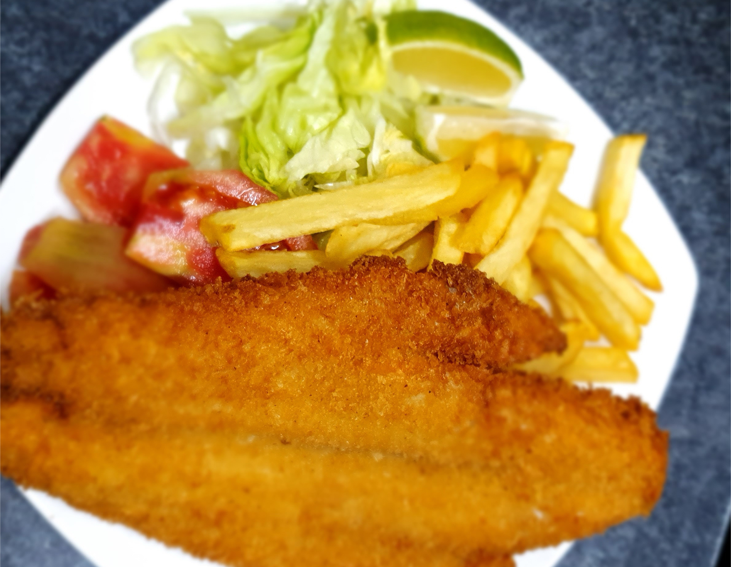 “El
pescado frito es el plato estrella en un ambiente hogareño y familiar”